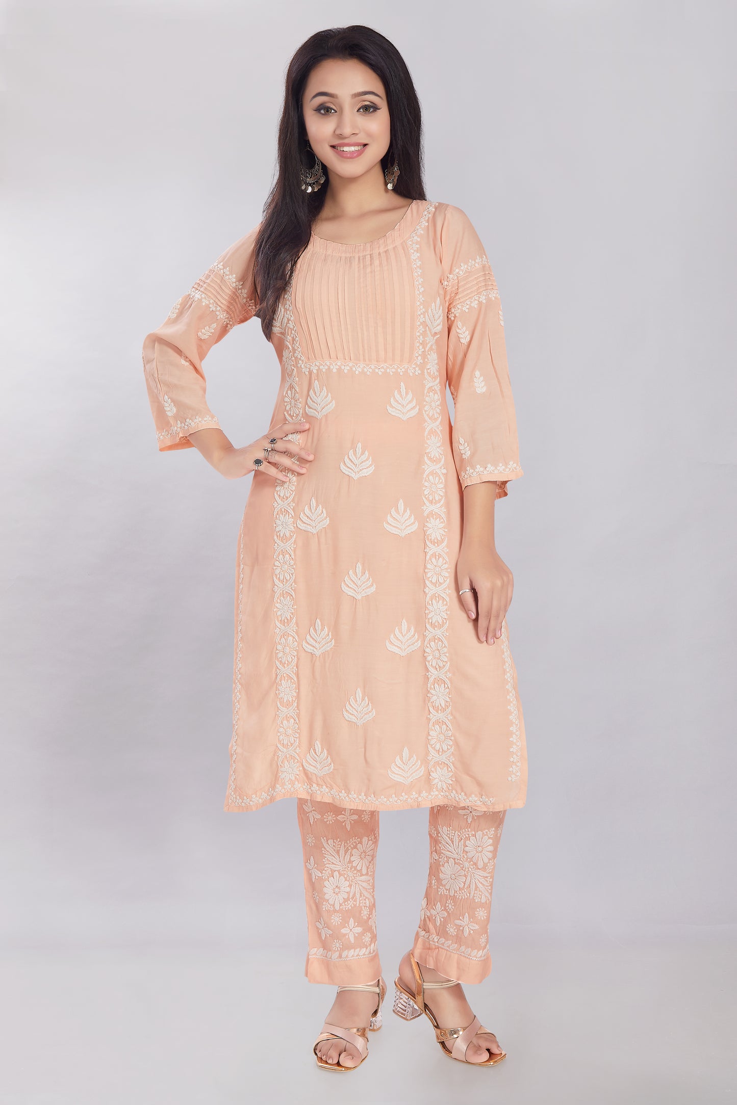 Inaya Salmon Peach Muzlin Kurti Set.