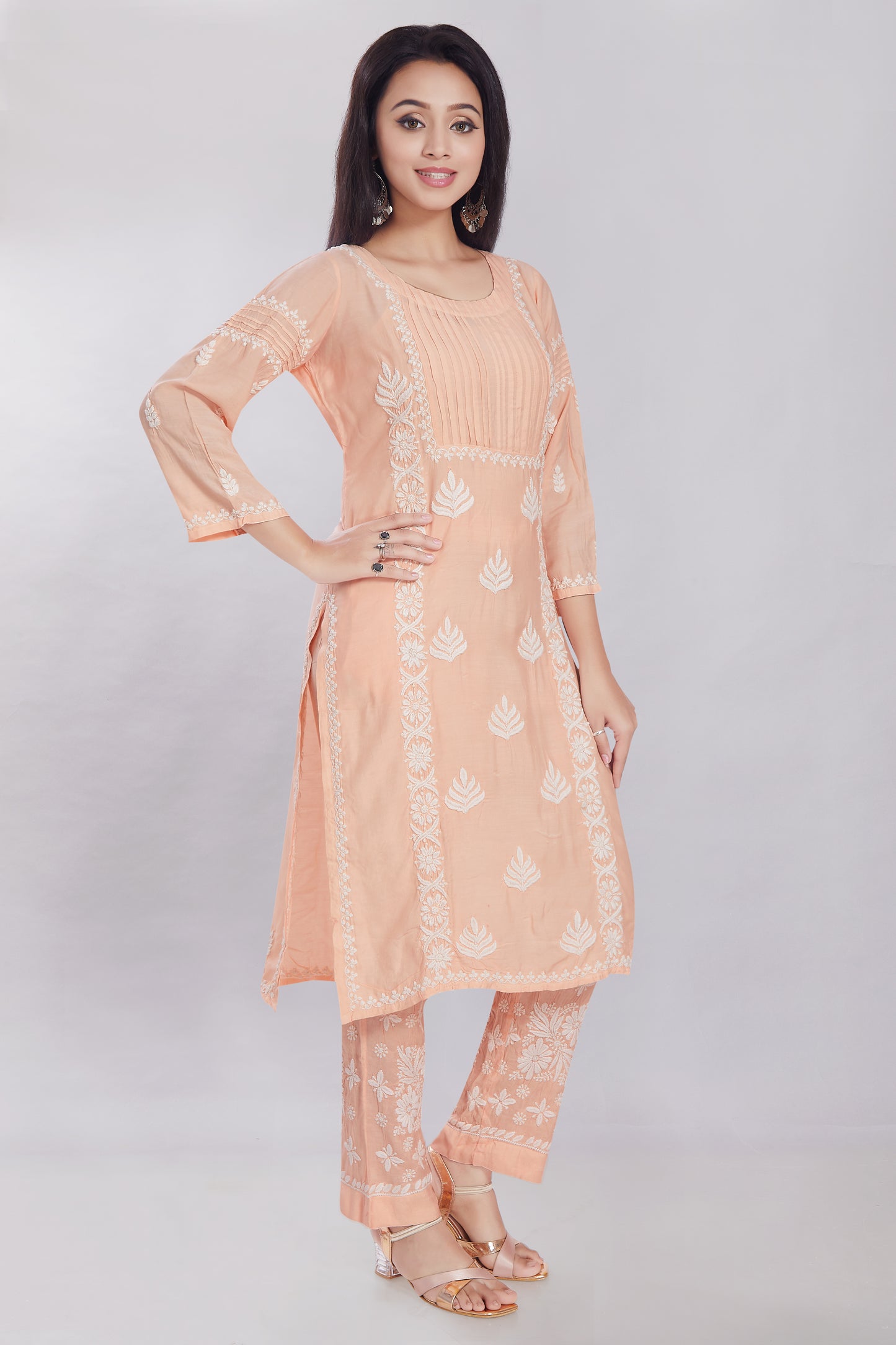 Inaya Salmon Peach Muzlin Kurti Set.